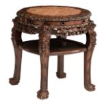 A Chinese richly carved exotic hardwood base with a marble top, H 58 - ø 55 cm