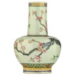 A Chinese celadon ground famille rose bottle vase, overall decorated with flower branches, with a