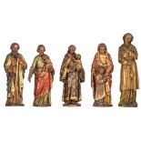 A lot of five polychrome wooden religious sculptures consisting of Saint Anne and the reading