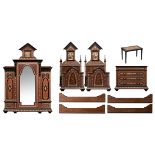 A probably Italian walnut and ebonised wood Moorish inspired bedroom set with bone, mother of pearl,