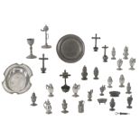 A various lot of pewter items consisting of casters, ewers, mustard jars, holy water fonts, a