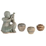 A Longquan type celadon figure holding a jug; added three Sui earthenware type covered jars, H 8,5 -