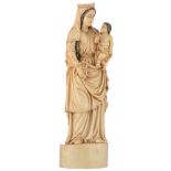 An Indo-Portuguese ivory Madonna and Child, 19thC, 40,5 cm - Total weight: 2926g Added expertise
