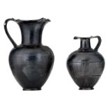 Two Etruscan Bucchero black pottery oinochoes (pouring vessels), probably 6 - 4thC B.C., H 19 - 26