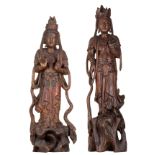 Two exotic hardwooden polychrome painted sculptures of Guanyins, H 56 - 60 cm