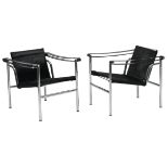 Two LC1 Le Corbusier armchairs for Cassina, steel tube frame, black tanned cowskin and leather, N°