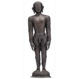 An Oriental and South East Asian bronze standing figure, with black lacquer patina, depicting a