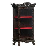 A fine Chinese openwork richly carved hardwood dragon and floral decorated display cabinet, about