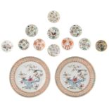 A pair of Chinese famille rose open work dishes, decorated with pheasants on flower branches and the