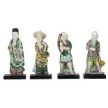 A lot of four Chinese famille verte Kangxi type 'Yu Qiao Geng Du' porcelain figures, depicting '