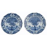 Two fine Delftware plates with a tea tree decoration and a fluted rim, marked 'De Bijl', 18thC, ø 35