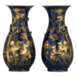 A pair of Chinese 'bleu soufflé' pear shaped vases, gilt and relief decorated with dragons and