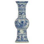 A Chinese blue and white yenyen vase, the center decorated with peacocks and flower branches, the