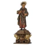 A polychrome painted wooden sculpture depicting Saint Joseph, set on a ditto base ornate with cherub