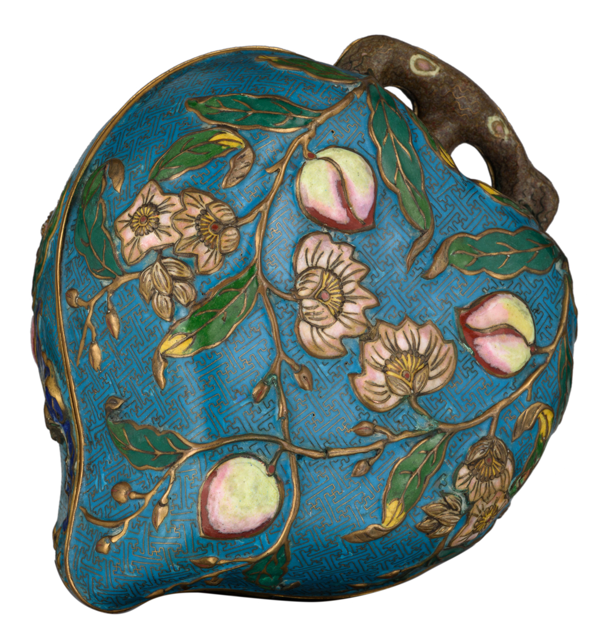 A Chinese peach shaped cloisonné box and cover, the outside with the symbolic nine peaches relief