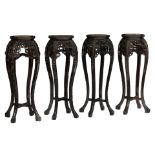 Two pairs of Chinese richly carved exotic hardwood stands, with a marble top, H 91 cm