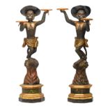 A pair of polychrome and gilt decorated Venetian monkey dumbwaiters on a faux marble base, 19thC,