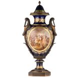 A bigger French Sèvres vase, bleu royale ground and the roundels polychrome decorated with a warrior