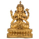 A Sino-Tibetan gilt bronze four armed Buddha on a lotus base, with semi-precious stone inlay, H 22