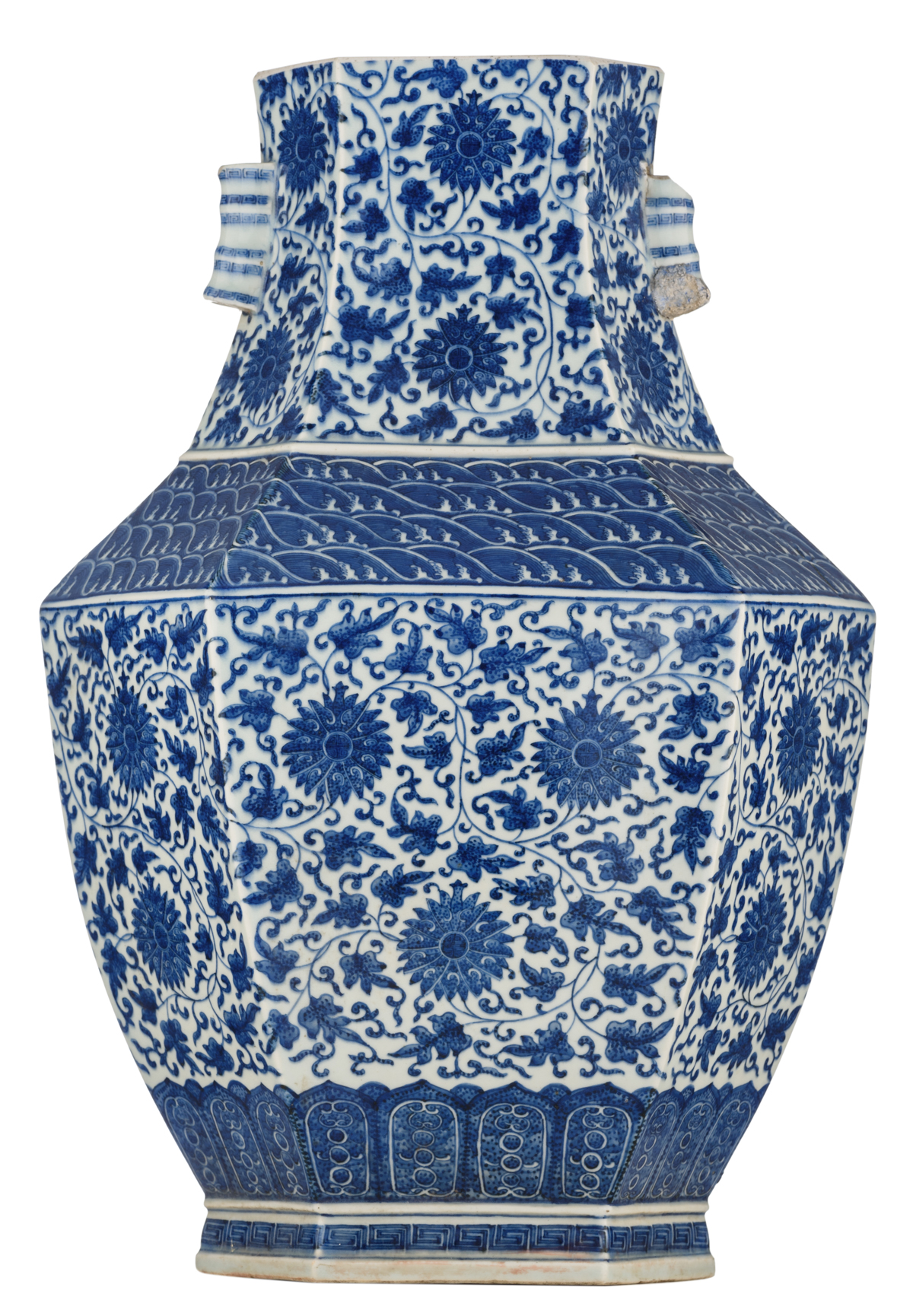 A Chinese hexagonal blue and white hu vase, decorated with floral scrolls and shou signs on the
