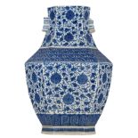 A Chinese hexagonal blue and white hu vase, decorated with floral scrolls and shou signs on the