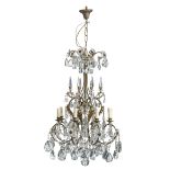 A floral decorated gilt brass chandelier with cut glass, H 115 cm