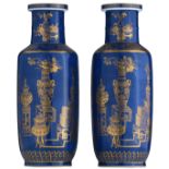 A pair of Chinese bleu poudré vases, gilt decorated with antiquities, flowers, pomegranates and