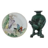 A Chinese famille verte dish, decorated with an immortal riding on a donkey, 18thC; added a