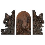 An oak alto relievo scene depicting Christ preaching from a boat; added a pair of walnut