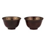 Two Chinese zitan hardwood cups, the inside with paktong coating, H 5 - ø 8,5 cm