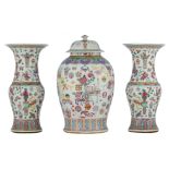 A Chinese covered vase, decorated with the one hundred antiquities and flower balls; added a pair of