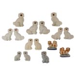 A lot of seven various Staffordshire spaniel pairs and added a single ditto, 19thC - 20thC, H 20 -