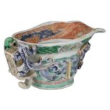 A famille verte Kangxi type libation cup, all around relief decorated with crawling chilongs, H