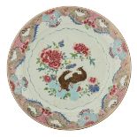 A famille rose export porcelain charger decorated with a pair of ducks in a lotus pond, 18th/