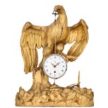 A French gilt wood clock in the shape of an eagle, 18th/19thC, H 47 cm