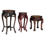 Three Oriental exotic hardwood carved stands, with a marble top, H 46 - 70 cm