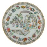 A Chinese famille rose plate, the centre decorated with a terrace scene, the rim with various