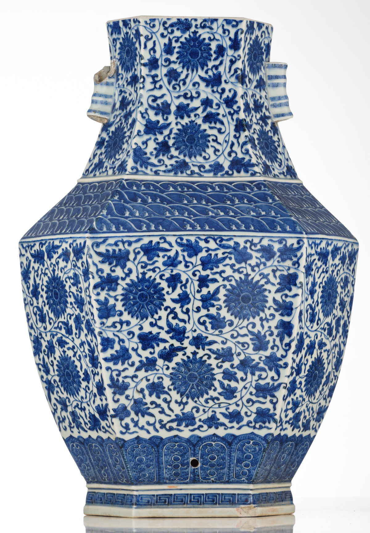 A Chinese hexagonal blue and white hu vase, decorated with floral scrolls and shou signs on the - Image 3 of 7