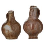 A Cologne bellarmine jug and a Frechen bellarmine jug, both decorated with a medallion, H 21 - 24,