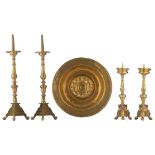 A 17thC Nurnberg wrought brass alms dish; added two pairs of baroque bronze church candle sticks,