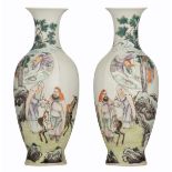 A pair of Chinese famille rose porcelain vases, decorated with scenes from the literature, with a