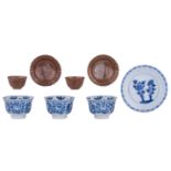 A collection of Chinese Kangxi period porcelain teacups and saucers, consisting of three blue and