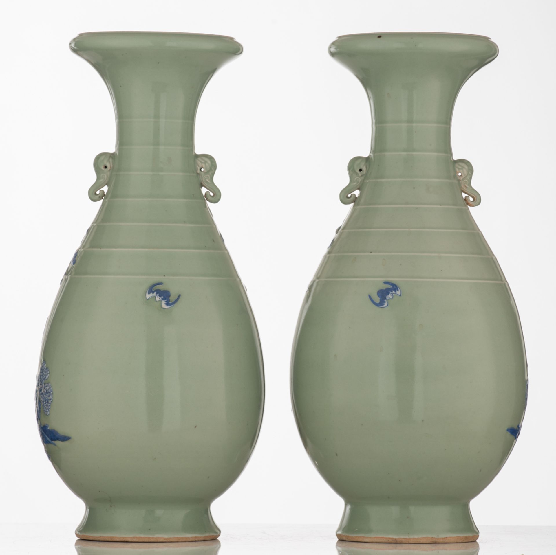 A pair of celadon ground begonia shaped vases, blue and white decorated with a scene from 'The - Image 3 of 6