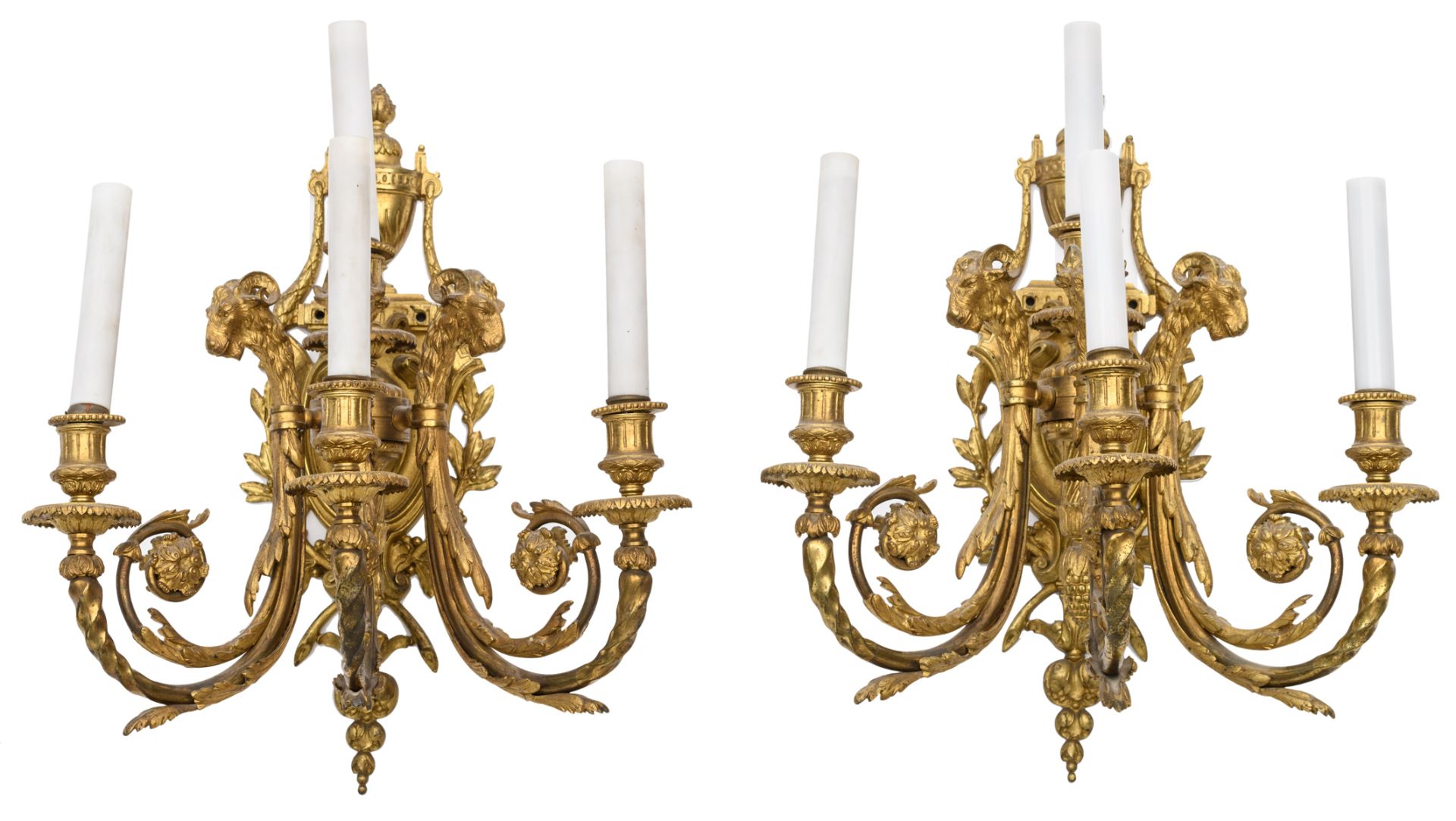 A nice pair of 19thC gilt bronze neoclassical wall sconces, the crest of the arms shaped as rams