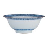 A Chinese porcelain blue and white deep bowl with a small flat rim