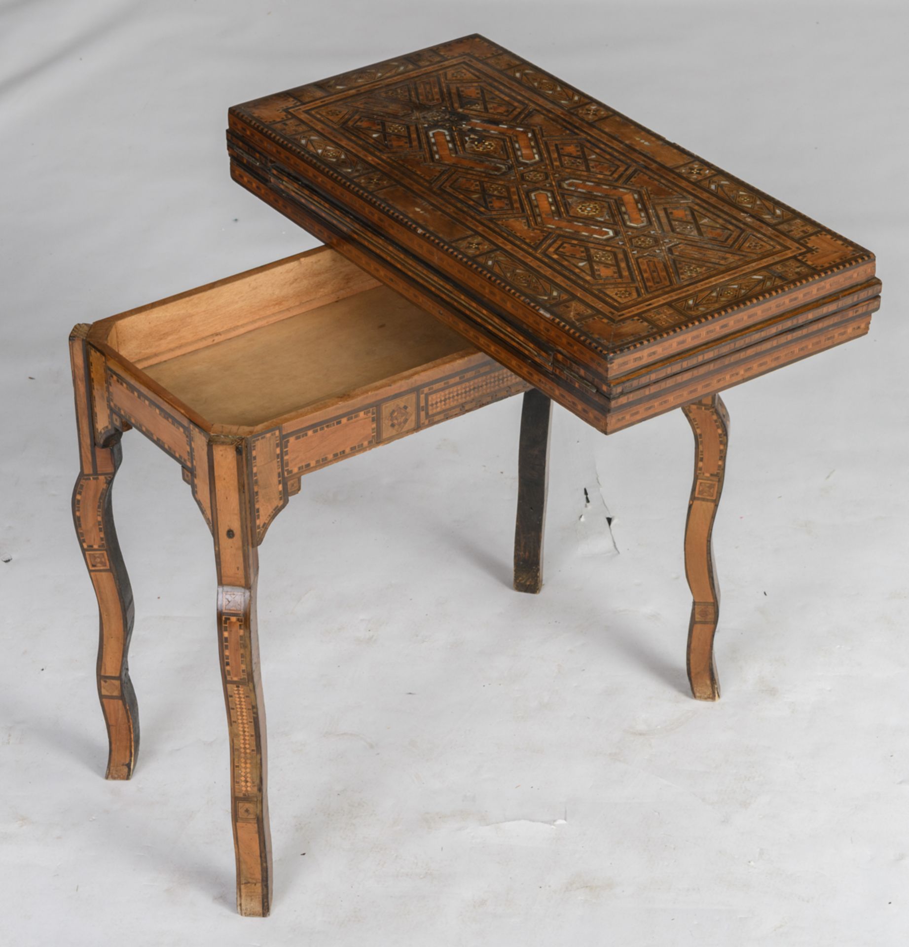 A Moorish inspired card table, inlaid with various wood types and mother of pearl, the folding top - Image 9 of 9