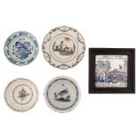 A lot of ten polychrome and blue and white decorated 'faience populaire' plates and bowls,