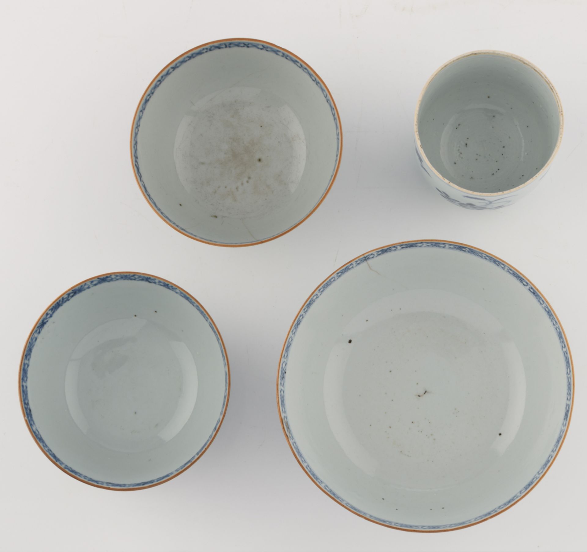 Nine Chinese underglaze-blue decorated café-au-lait glazed dishes with various flower designs; - Image 14 of 15