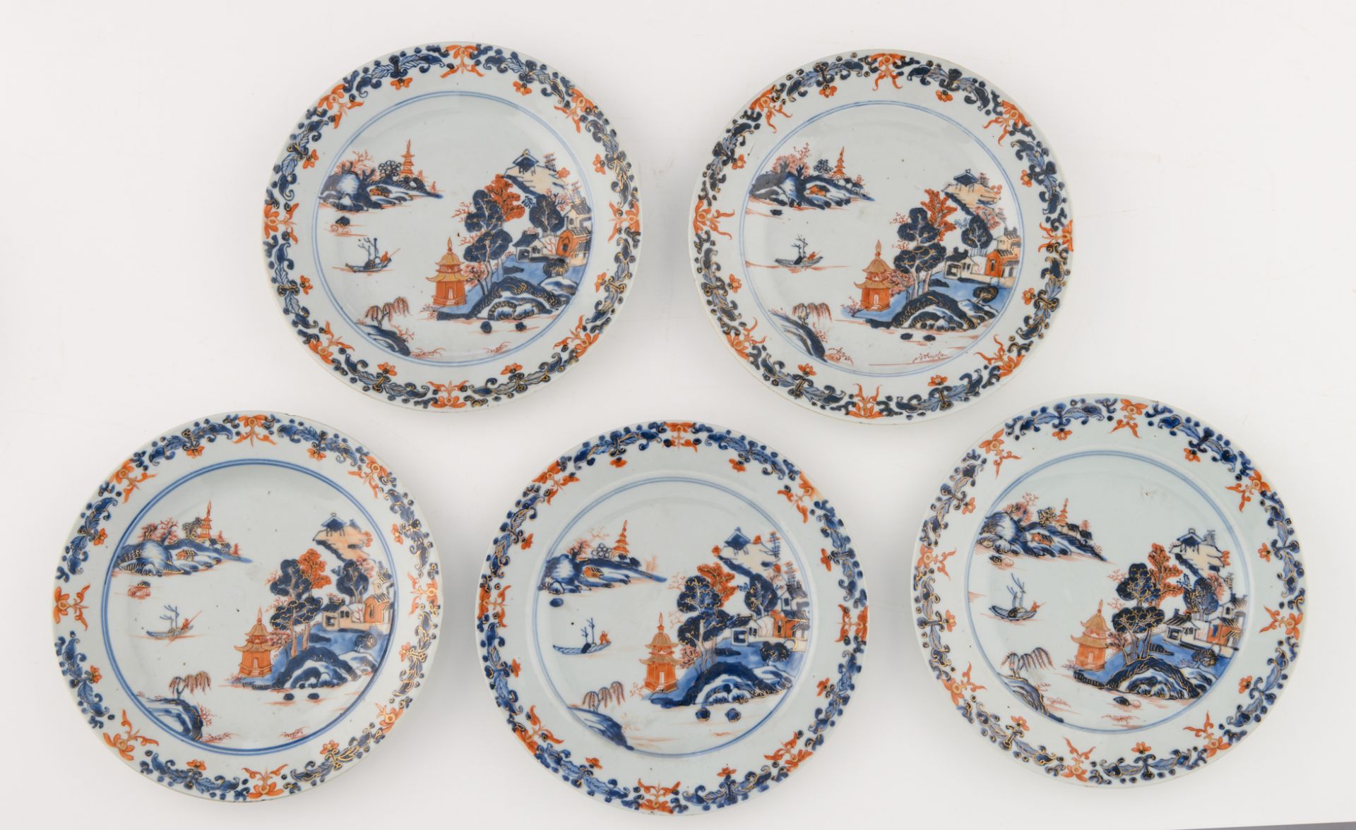 Nine Chinese Imari export porcelain dishes, decorated with a fisherman in a village landscape, - Image 2 of 5