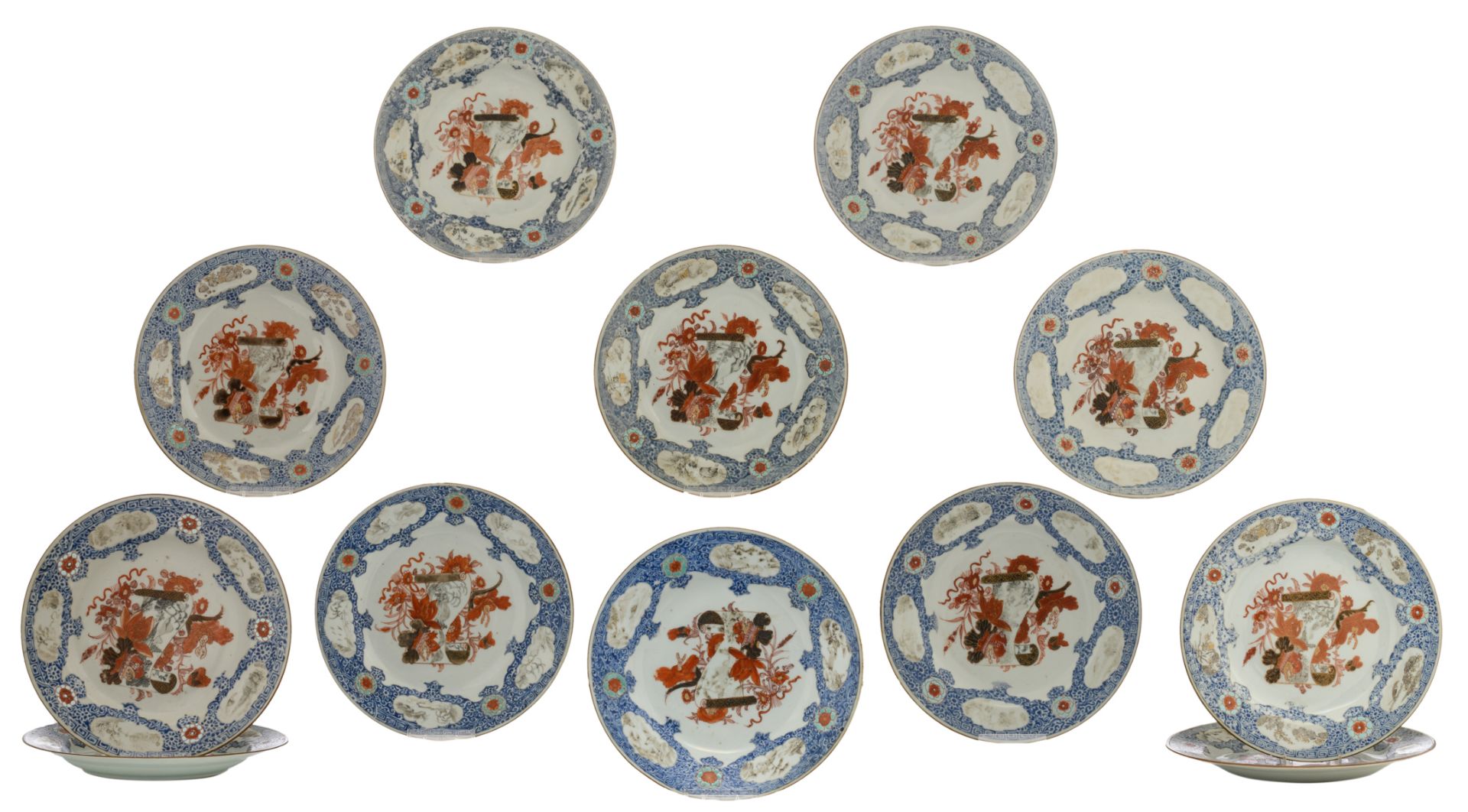 Twelve Chinese export porcelain dishes with a Japanese inspired decoration in iron red, gilt and